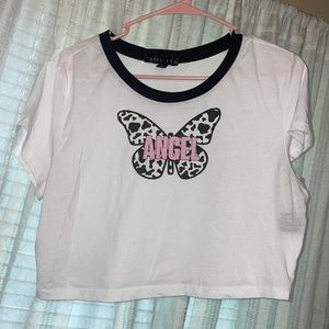 white crop top with angel lettering